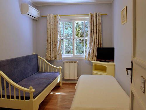 quarto pousada jardim azul