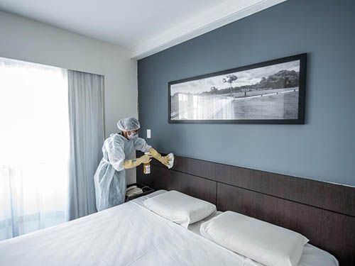 quarto San Diego Suites Pampulha