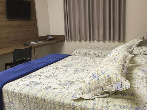 Cama do JP Palace Hotel