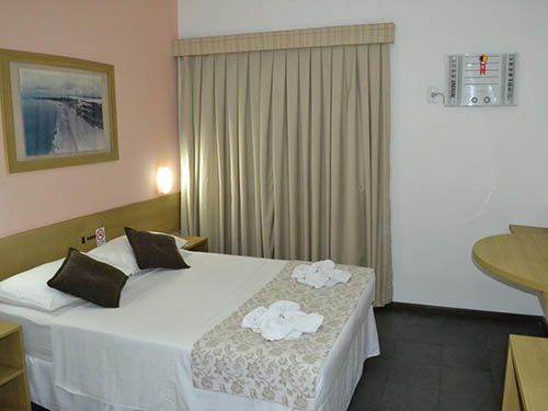 Cama do hotel Ponta Negra