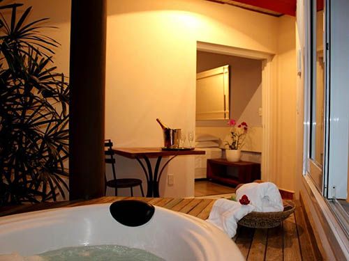 Banheira do Hotel Boutique Frangipani