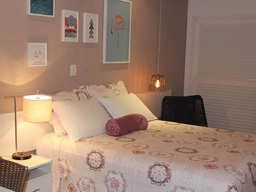 Cama do Hotel Boutique Frangipani