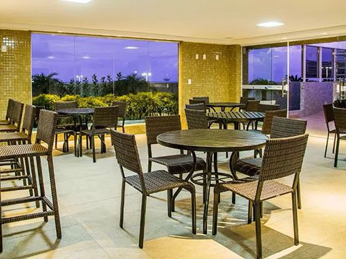 messas e cadeiras da Laguna Praia Hotel