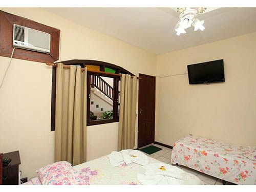 Cama da Pousada das Flores