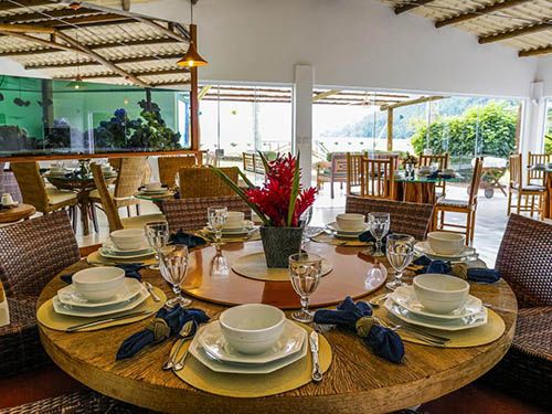 mesa de restaurante do Buddha Village Boutique Hotel