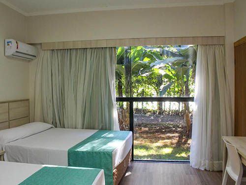 Camas do Hotel Nacional Inn Iguaçu