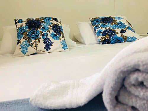 Cama na Pousada Mar Azul