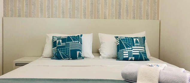 Cama na Pousada Mar Azul