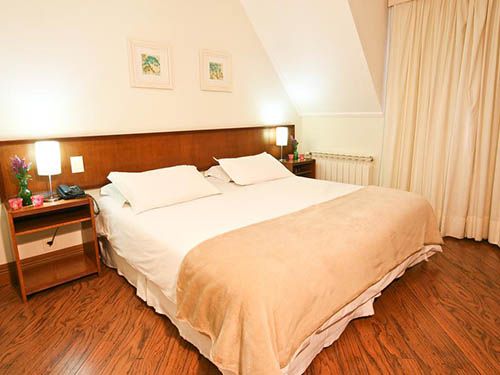 Cama da pousada Campos de Provence Campos do Jordão