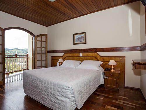 Cama no Hotel Leão da Montanha
