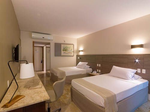 Camas do quarto no Hotel Atlante Plaza